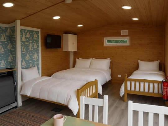 Marquess Pod | Sleeping Area | Osea Meadows | Glamping Accommodation